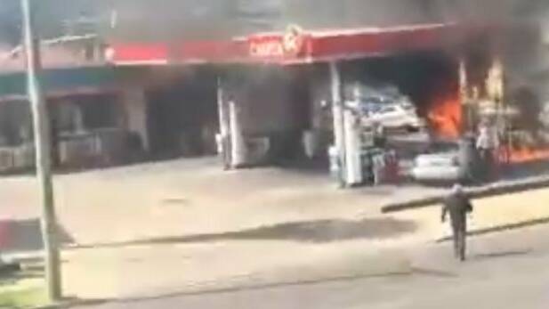 CCTV footage from the Abbotsleigh Motel taken of Mr Smith running toward the fire at the Caltex in Armidale.