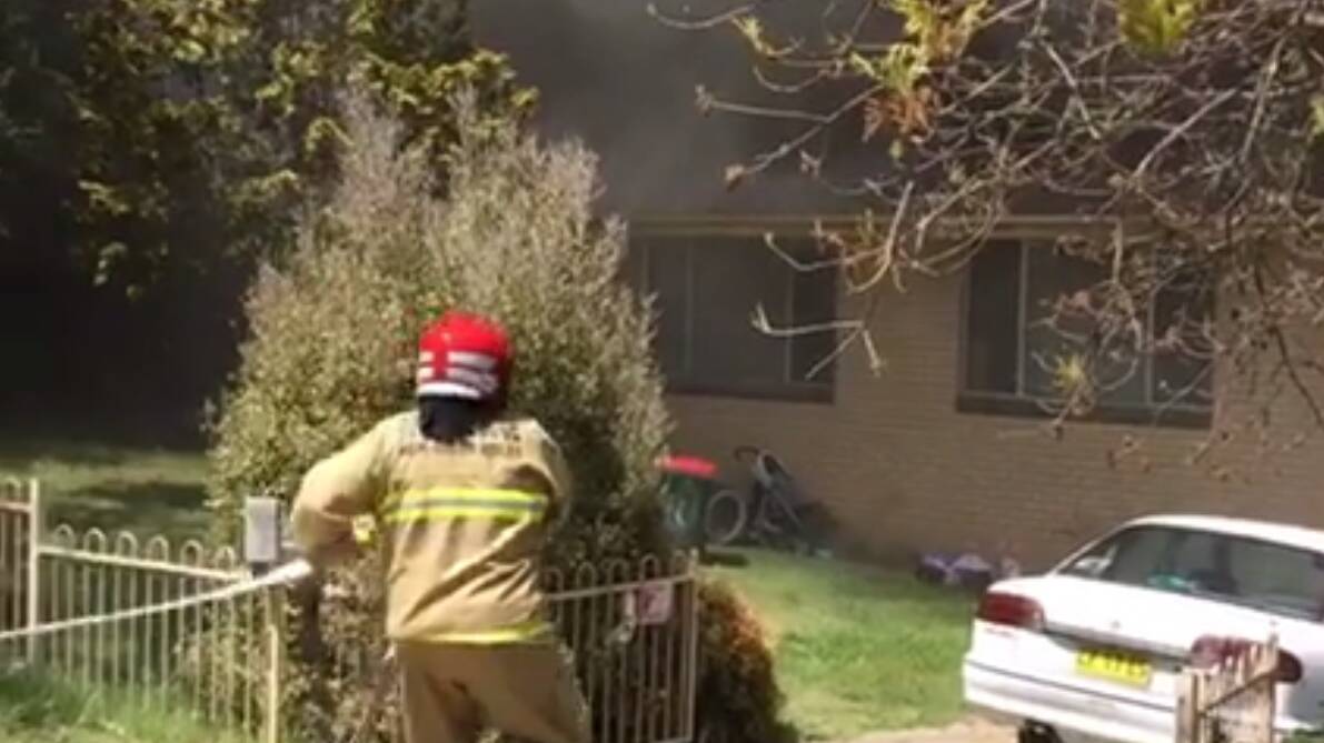 Armidale Fire and Rescue attends to the blaze at the Schultz Avenue home.