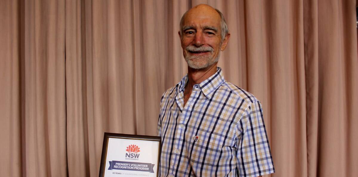 VOLUNTEER AWARDS: Swimming instructor Keith Fleming was awarded the NSW Premier's Volunteer Recognition award for 40 years of service.