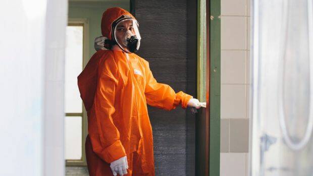 An asbestos removalist. Photo: Rohan Thomson.
