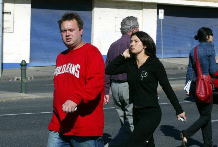 Gangland.   another gangland murder  - in Carlton - Carl Williams arrives at the scene with his wife Roberta Williams.   Melbourne Age.   news.   Photo by Angela Wylie.   March 23 2004.  SPECIAL GANGLAND