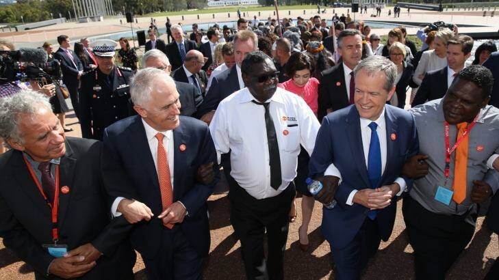 Prime Minister Malcolm Turnbull and Opposition Leader Bill Shorten came together last month to link arms in support of ending family violence in Indigenous communities. Photo: Andrew Meares