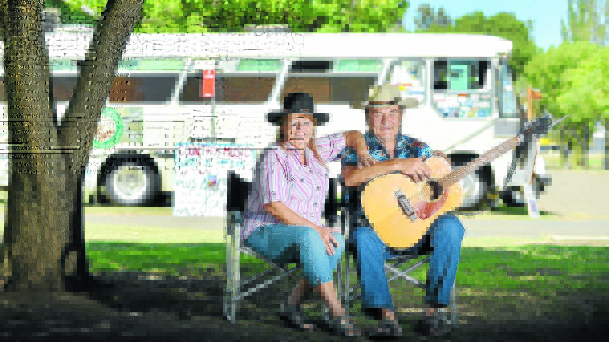 VETERAN CAMPERS: Barry K and Lin Chandler have been visiting the country music festival for 24 years and, with a busload of stories to tell, the performing duo will be launching their 10th album. Photo: Barry Smith 100116BSC07