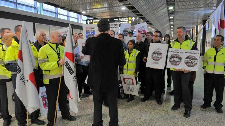 Union members in a stop-work meeting at Melbourne's international airport in 2015. Photo: Joe Armao