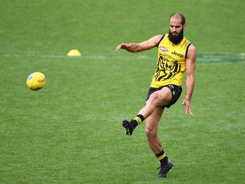 Injured Richmond players Bachar Houli and Dion Prestia have been ruled out of their AFL opener.
