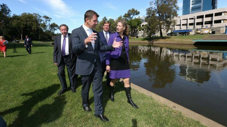 NSW Premier Mike Baird and Powerhouse Museum director Dolla Merrillees, pictured in April, opposite the proposed new site for the museum in Parramatta. Photo: Louise Kennerley