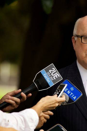 Attorney-General George Brandis has announced the royal commission into trade unions will now report back by December 31, 2015. Photo: Wolter Peters