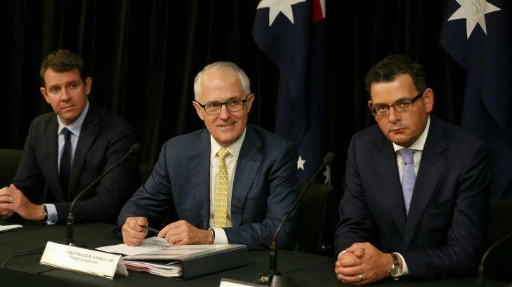 NSW Premier Mike Baird, Prime Minister Malcolm Turnbull and Victorian Premier Daniel Andrews address the media during a joint press conference after the Council of Australian Governments (COAG) meeting at the Commonwealth Parliamentary Offices in Sydney last December. Photo: Alex Ellinghausen