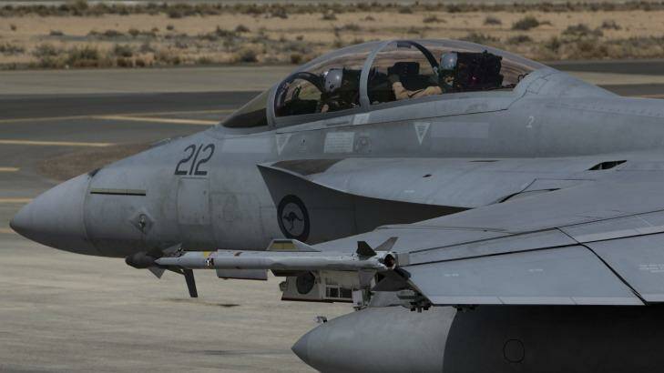 A Royal Australian Air Force F/A-18F Super Hornet taxis to begin another mission in the Middle East. Photo: Andrew Eddie