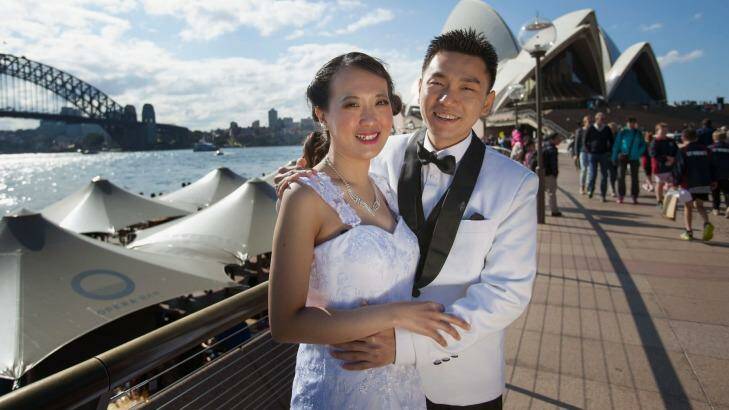 Juliana Wuisan and Hermawan took advantage of an auspicious date and a shining Sydney day to take their wedding photos. Photo: Fiona Morris