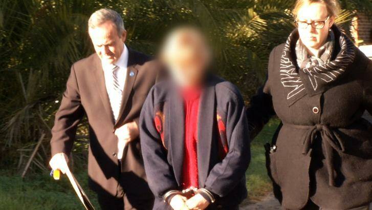 The naturopath is arrested by the Child Abuse Squad. Photo: NSW Police Media