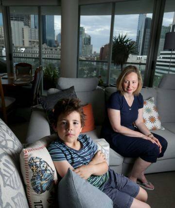  Janine Standfield poses for a photo with her son Ethan at Docklands on October 7, 2014 in Melbourne, Australia. As there are no primary schools in Docklands, Janine has had to send Ethan to the sixth nearest school. (Photo by Wayne Taylor/Fairfax Media)