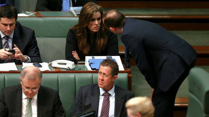 "What should we say next?":  Tony Abbott consults with Peta Credlin.  Photo: Alex Ellinghausen