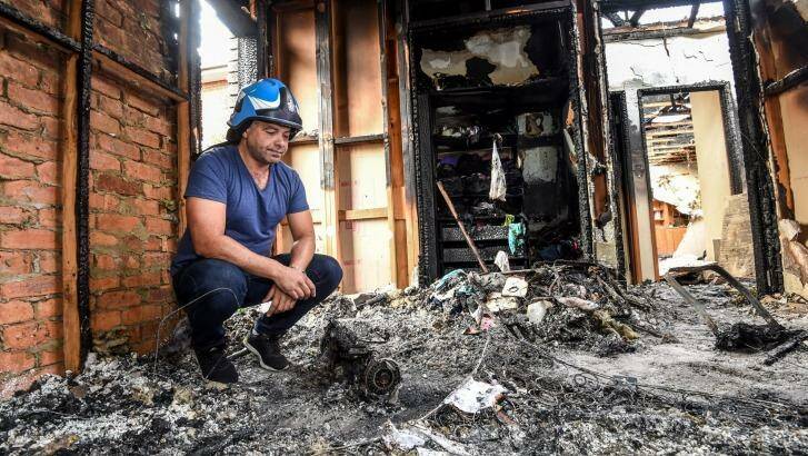 Ash Ibraheim in his daughter bedroom after it was destroyed by a fire sparked from a charging 'hoverboard'. Photo: Justin McManus 