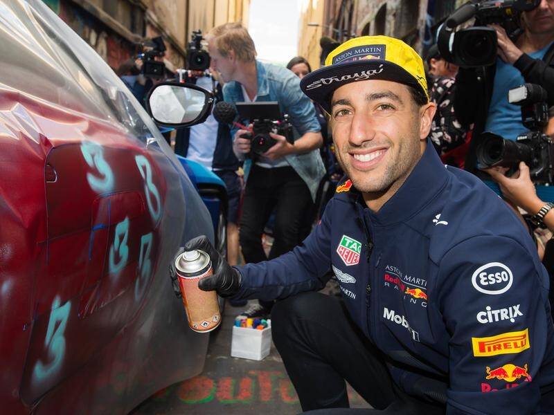 Australian racing star Daniel Ricciardo graffitied an Aston Martin in Melbourne's Hosier Lane.
