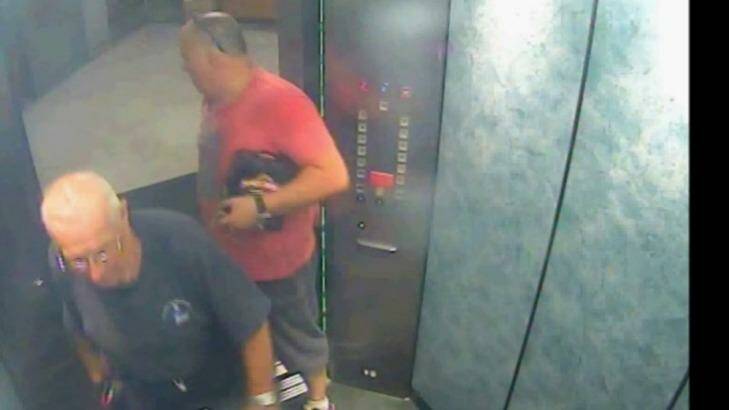 Glen McNamara, holding a six pack of James Boags under his arm, with Roger Rogerson in the lift of McNamara's Cronulla apartment on May 20, 2014 - the day Jamie Gao was killed. Photo: Supplied