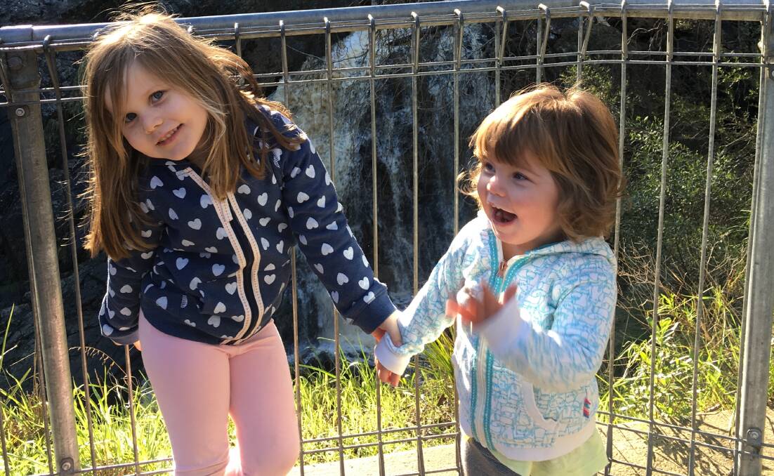 SISTERLY LOVE: Ava, 4, and Sadie Lester, 2, shortly before Ava's leukimia diagnosis uprooted the family to Melbourne for treatment. Picture: CONTRIBUTED