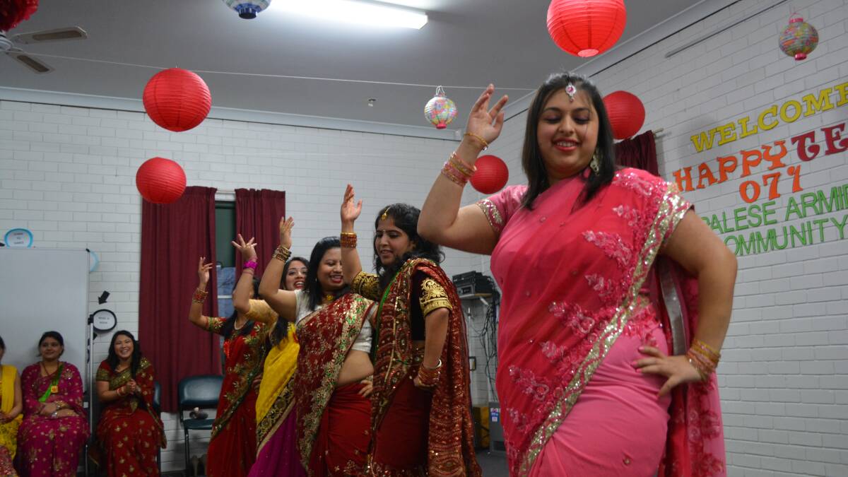 FIRST FOR ARMIDALE: Some of the cities Nepalese women dance at Kent House for Teej. The event commemorates the union of Goddess Parbati with Lord Shiva.