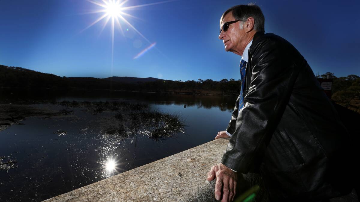Councillor Colin Gadd surveys Dumaresq Dam. 