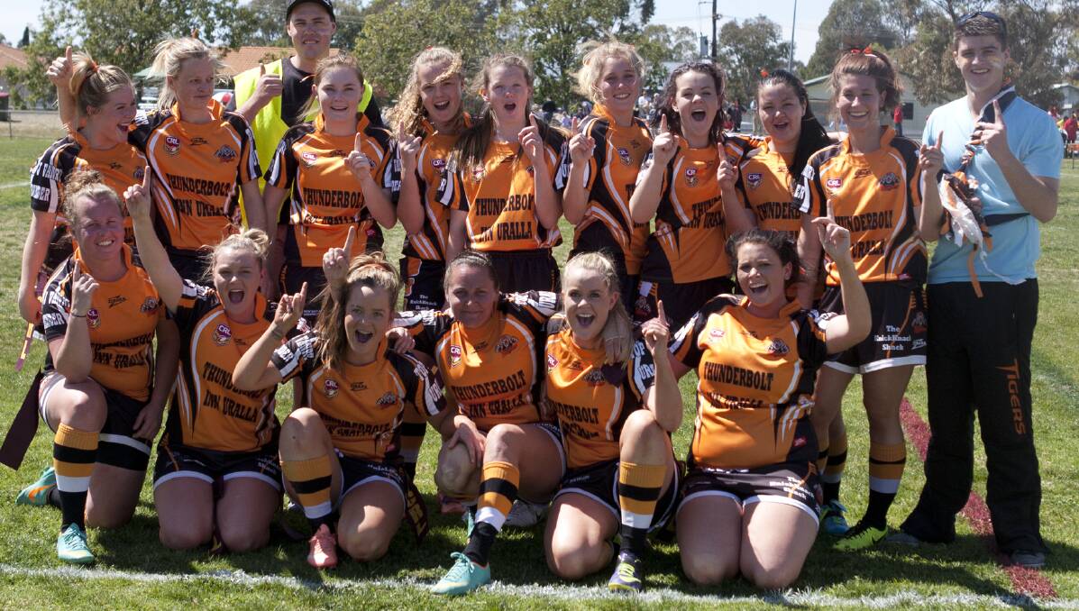 The Uralla Tigers league-tag side celebrate their grand final win.