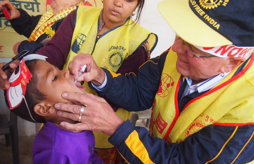 DISEASE ERADICATION: Armidale’s Rotarians are out with their red buckets tomorrow to raise money to end polio.