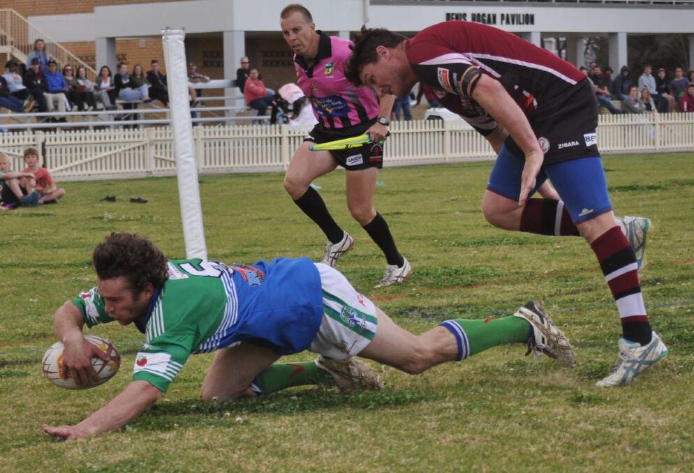 LAST DITCH EFFORT: Shaun Cox dives over in the corner for the Rams in the 79th minute of Saturday’s minor semi-final loss to Inverell. Fred Waters’ subsequent conversion attempt was just wide.