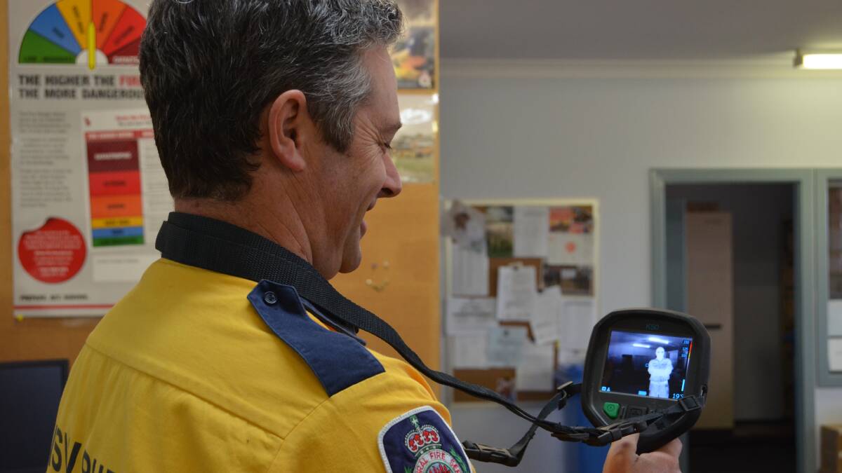 THERMAL IMAGING: Theron King from the Rural Fire Service tests out the new infrared cameras, which will boost fire fighting efforts in the region.