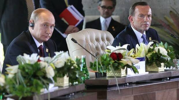 POWER GAMES: Vladimir Putin with his Australian counterpart Tony Abbott at the APEC summit last year.