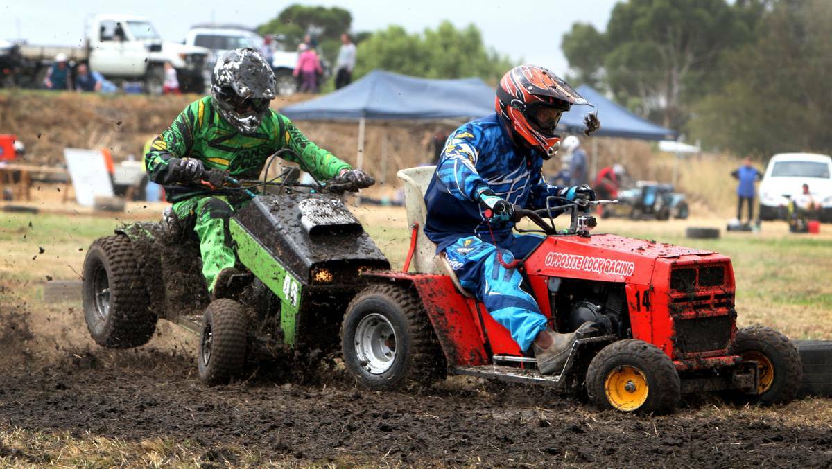 WARRNAMBOOL: Robert Colquhoun and James Roser collide during a 250cc mower race at the Heywood Wood Wine and Roses Festival. Picture:LEANNE PICKETT