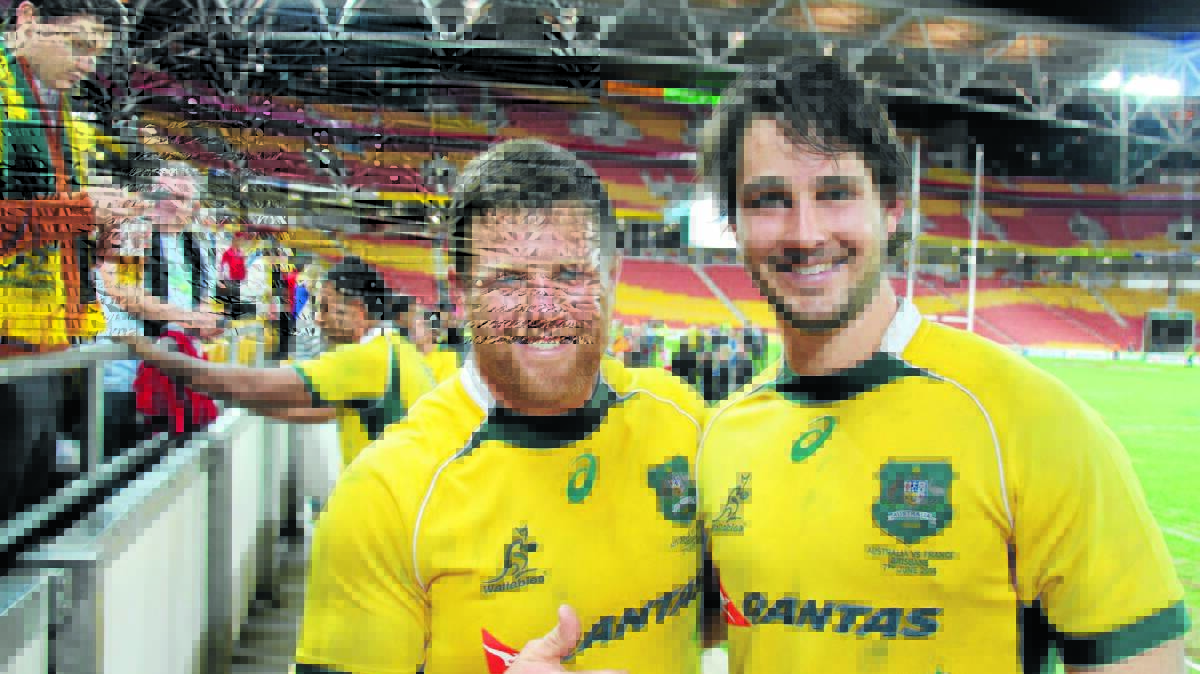Tamworth's Paddy Ryan (left) and Quirindi's Sam Carter (right) after playing together for the Wallabies last month. Tonight they'll be in enemy camps with Ryan's Waratahs taking on Carter's Brumbies for a spot in the Super 15 final.