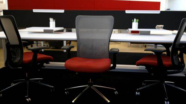 Hot desking is a trend in workplaces but is despised by some private sector staff. Photo: Louise Kennerley
