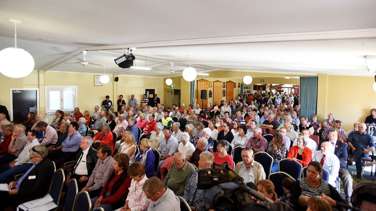 STANDING ROOM ONLY: More than 50 Guyra residents spoke out against the merger, with at least 350 people packing into the meeting. Photo GARETH GARDNER