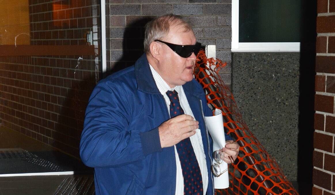 JAILED: John Farrell outside Armidale Local Court in 2014