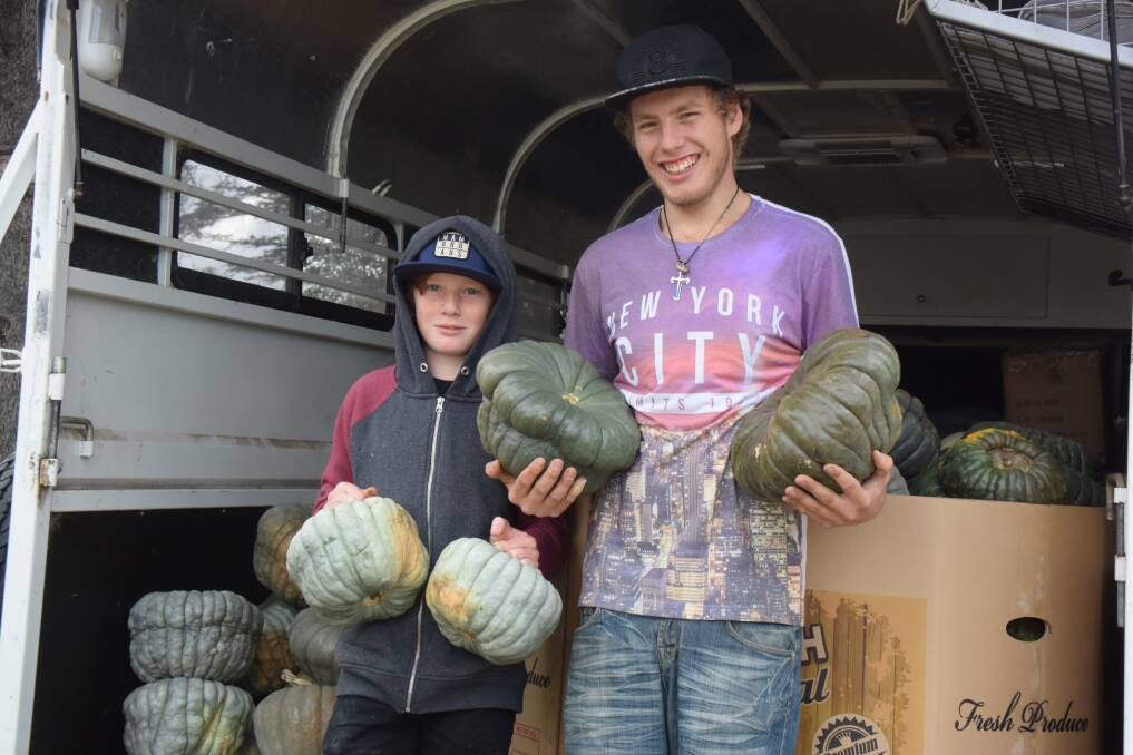 TO MARKET, TO MARKET: Jacob Bradley and Nathaniel Keuntje will be travelling down to Sydney to deliver their bumper pumpkin harvest to needy people. 