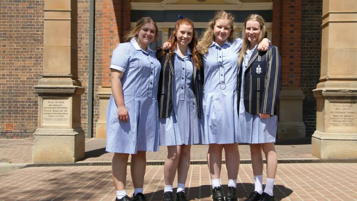 MAKING HISTORY: From left, TAS girls Elyssa Rogers-Ellis, Holly Tearle, Emily Blackbourne and Maddy Dennis yesterday.