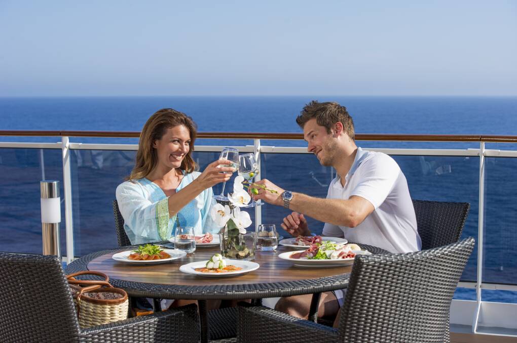 A couple enjoying the deck on board. Image MSC