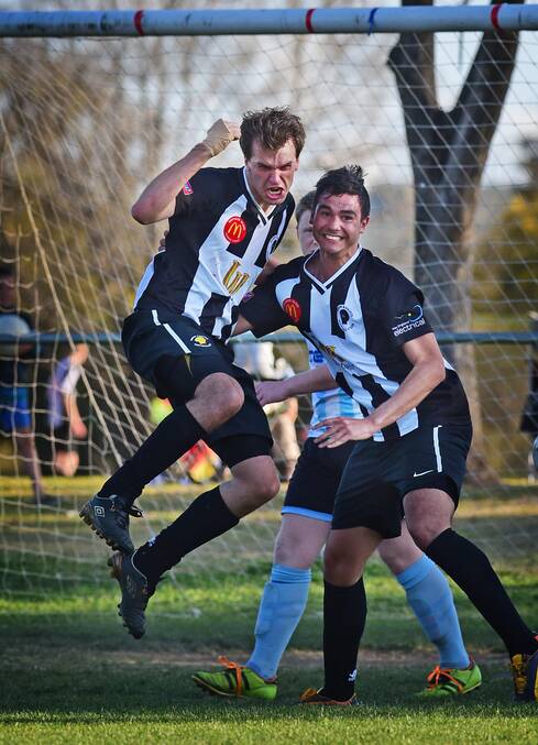 ELATION: Goal scorers James Thompson and Josh Quaife embrace after a goal on Saturday. Photo Northern Daily Leader.