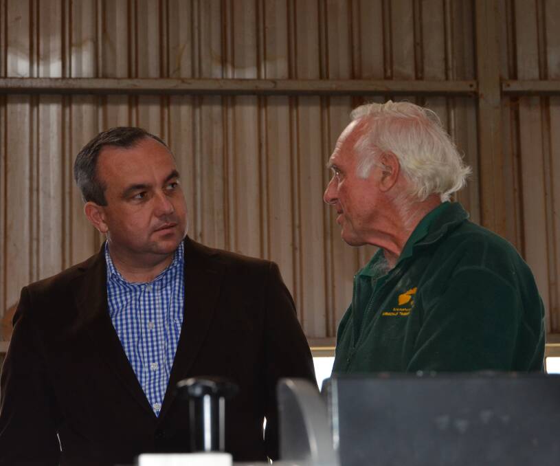 NSW Mental Health Minister Jai Rowell talks to a member of the Armidale Men's Shed.