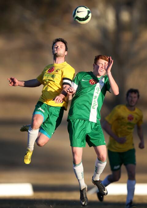 AIRBORNE: South Armidale skipper Ben Wright, left, was one of the goal scorers for South Armidale against North on Saturday.