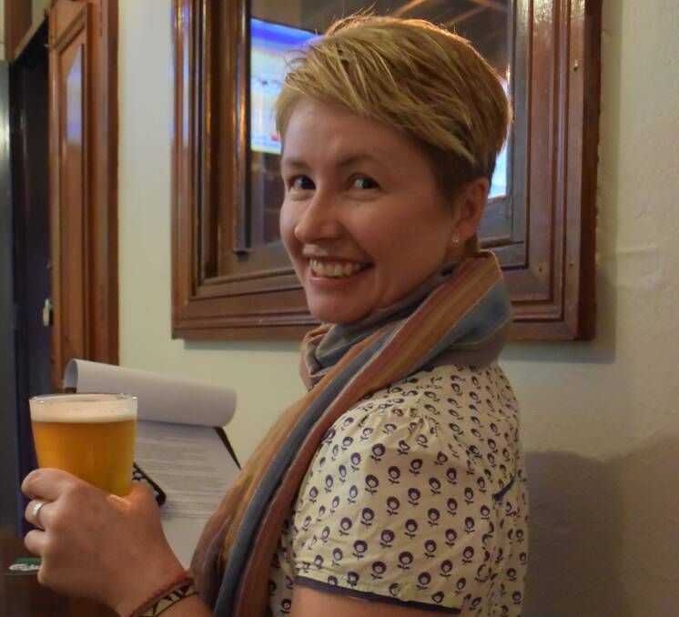 DRINK IT IN: Kirsti Abbott hopes the variety of topics at the event will provoke interest and discussion over a beer.