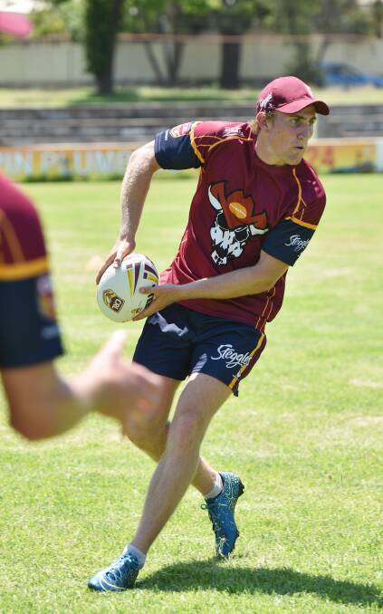 Muswellbrook’s Brock Matthews  completes a passing drill at Saturday’s GNA session at Jack  Woolaston Oval. Photo: Geoff O’Neill 211115GOB06