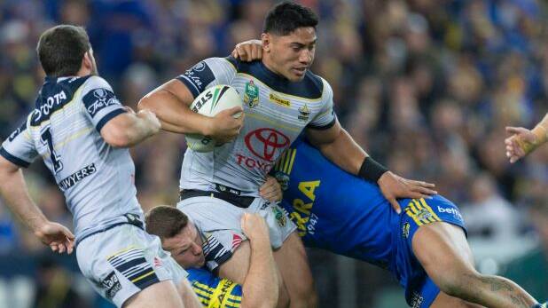 Wrecking ball: Jason Taumalolo goes for a gallop. Photo: AAP