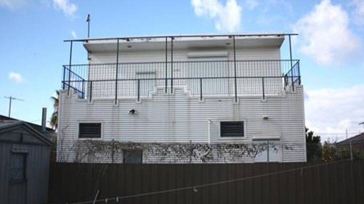 Lock up and leave ... Metal clad exterior of the property in Rowan Street, Glenroy, once owned by Terrence Tognolini. Photo: Supplied
