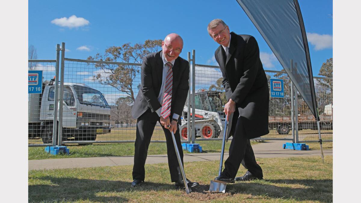 MILESTONE: Vice-chancellor Jim Barber and chancellor John Watkins turn the first sods at the development.