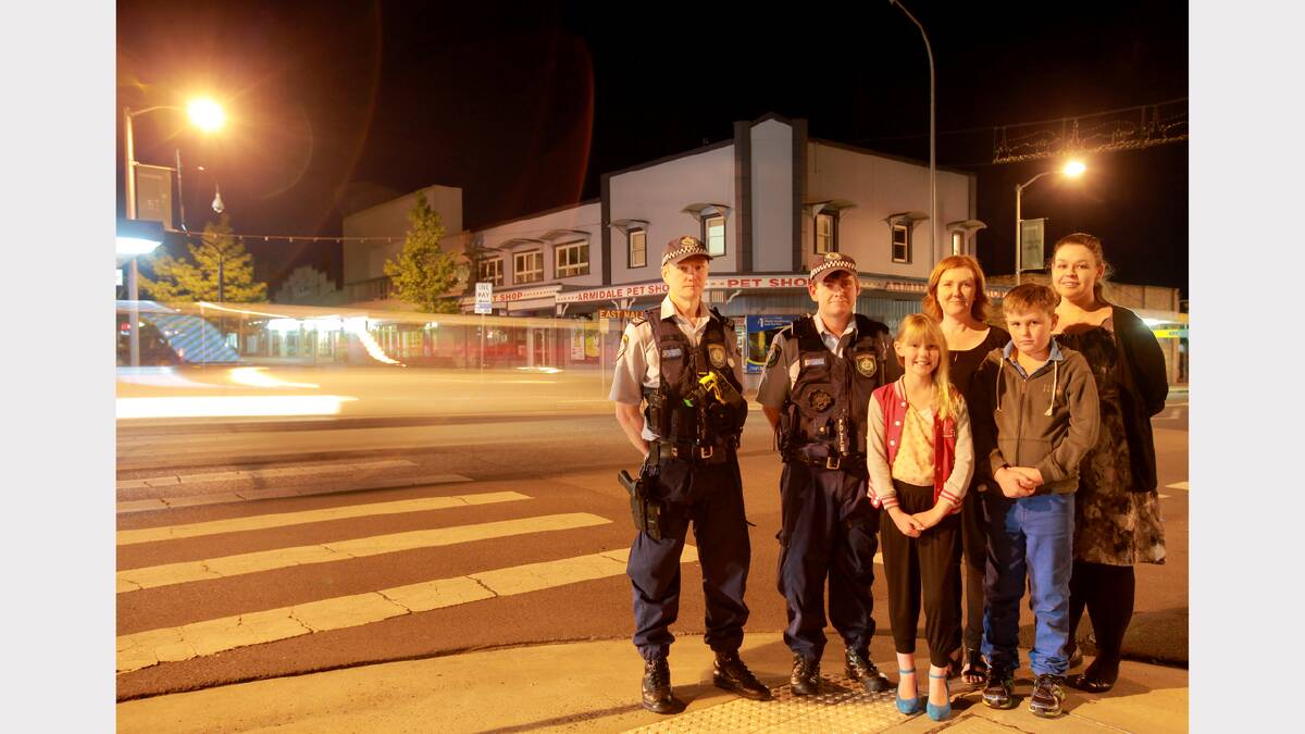 RECLAIMING THE NIGHT: Senior constable Tim Sutherland, constable Adam Bush, senior constable Cheryl Hall and Terri King with Neve Crotty and Ronan Crotty.