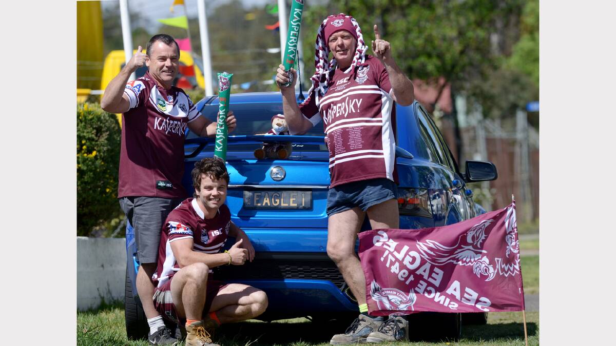 Meanwhile Manly men Phil and Ben Wright and Wayne Cundy pose with Phil's 'Eagle 1' car. Both teams are looking for victory in the NRL grand final.