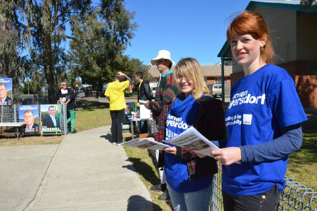 Jessica Malnersic and Catherine Corbett were handing out at Ross Hill Public School for the Labor Party.