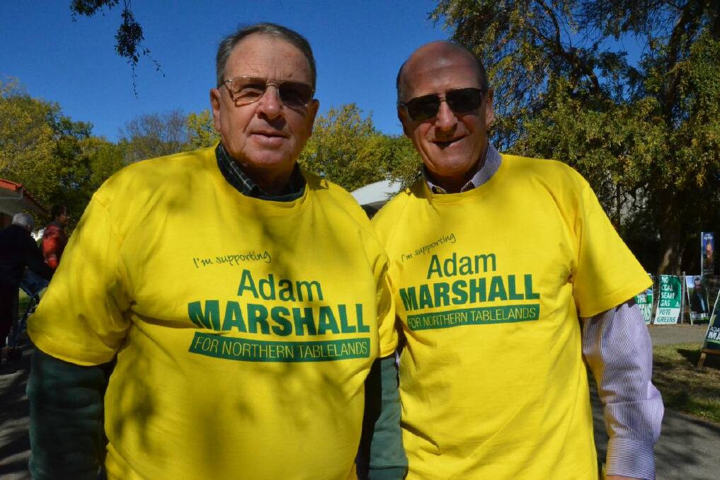 Graeme McKenzie and Paul Cook show their support for Adam Marshall outside Inverell Public School.
