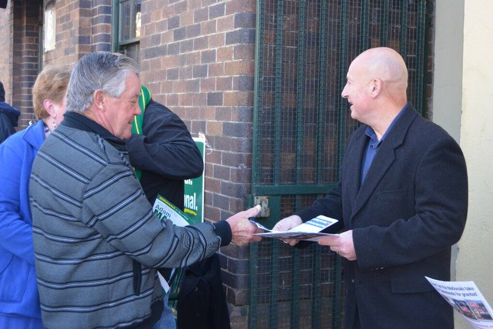 NSW Opposition Leader John Robertson speaks to voters in Armidale.