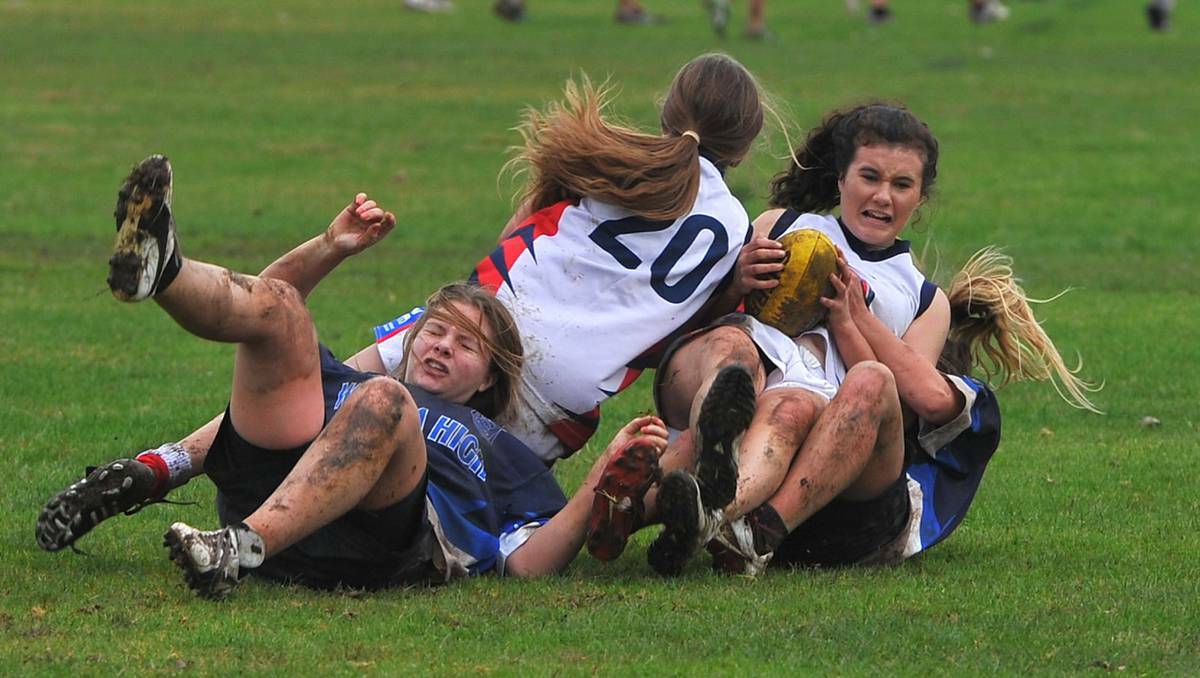 Kildare's Lucy Musgrave and Zoe McFarlane battle with Wagga High's Jasmyn Coombe and Cassidy Cox for the ball in the at the under 15 girls AFL gala day at Jubilee Park. Picture: Addison Hamilton, The Daily Advertiser